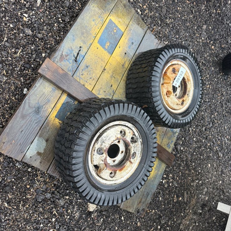 #753 • Pair Of Lawn Tractor Wheels & Tires