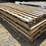 #106-•-(4)-wooden-pallets-52"-x-148-1/2"-x-6-1/2"-image-1