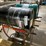 #211-•-(2)-55-gallon-lubricant-drums-with-wheeled-cradles-image-4