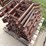 3--pallets-of-v-shaped-metal-grain-bin-supports-image-12