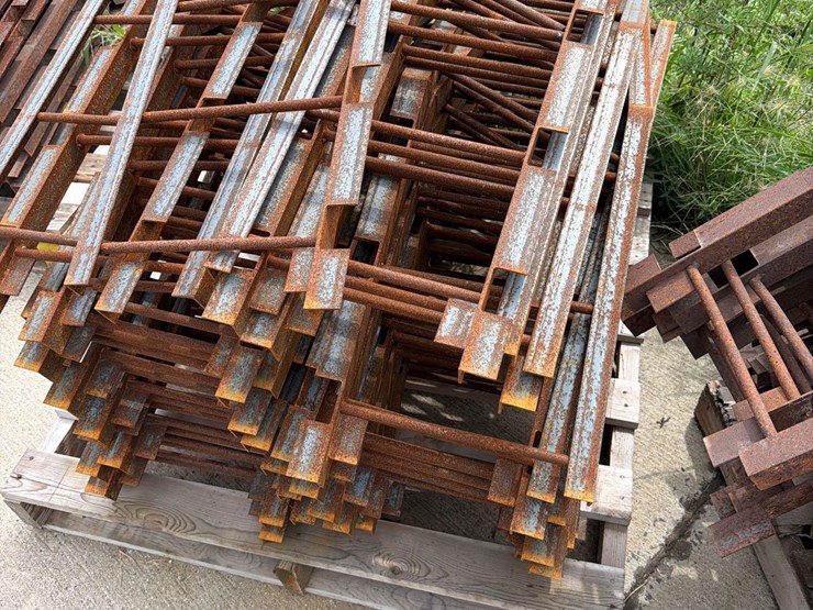 3--pallets-of-v-shaped-metal-grain-bin-supports-image-11