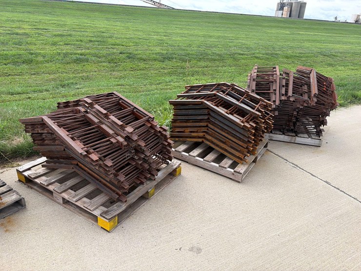 3--pallets-of-v-shaped-metal-grain-bin-supports-image-1