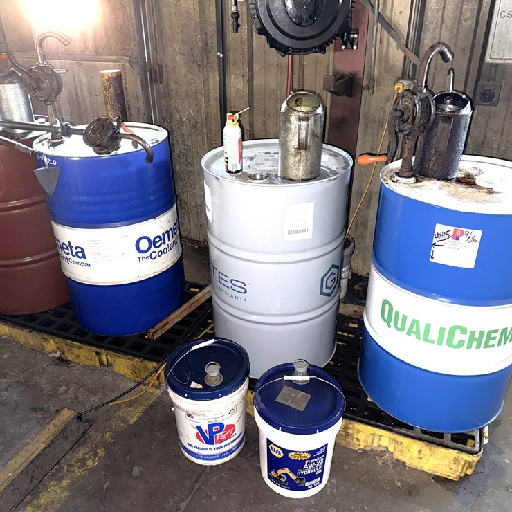 SECTION W/ 4- 55 GAL DRUMS & 5-Gal Pails MOSTLY FULL OF MACHINING COOLING LUBRICANTS W/ HAND PUMPS & CATCH PANS