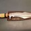 custom-damascus-steel-fixed-blade-knife-with-cream/red/green-striped-handle-image-1