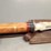 custom-damascus-steel-fixed-blade-knife-with-yellow/red-striped-handle-image-3