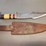 custom-damascus-steel-fixed-blade-knife-with-cream/red/green-striped-handle-image-4