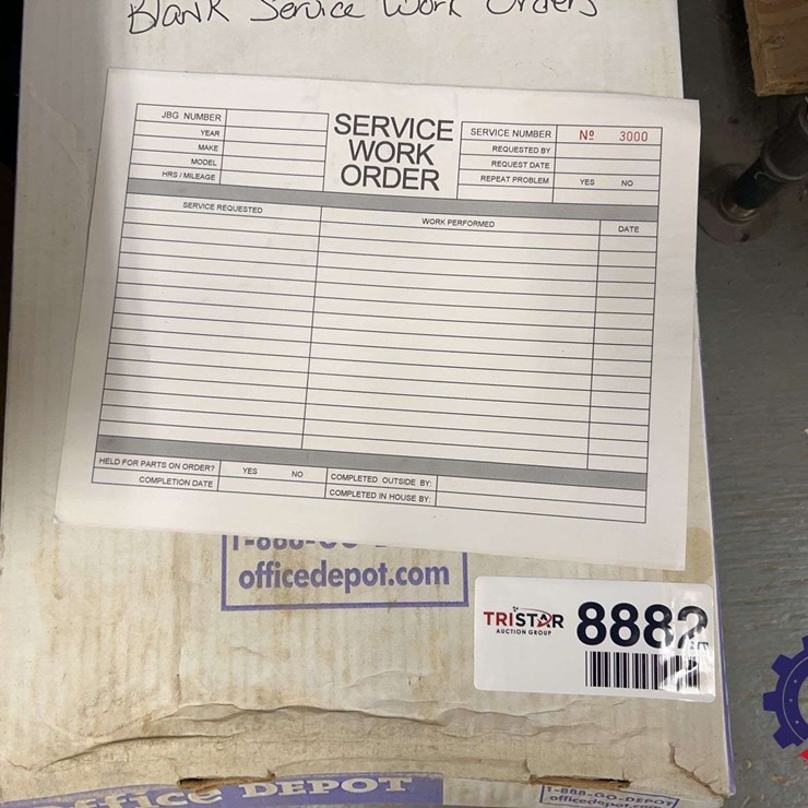 Box of blank service work order forms, sequentially numbered