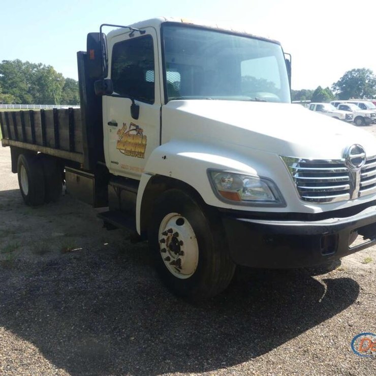 2007 HINO FLATBED DUMP TRUCK, S/N 5PVNJ8JT472S50849 S/A, HINO DIESEL ENG., 6-SP., AIR BRAKES, 16' HYD. DUMP BED, 22" STAKE SIDES, 11R22.5 TIRES, 287K MI.