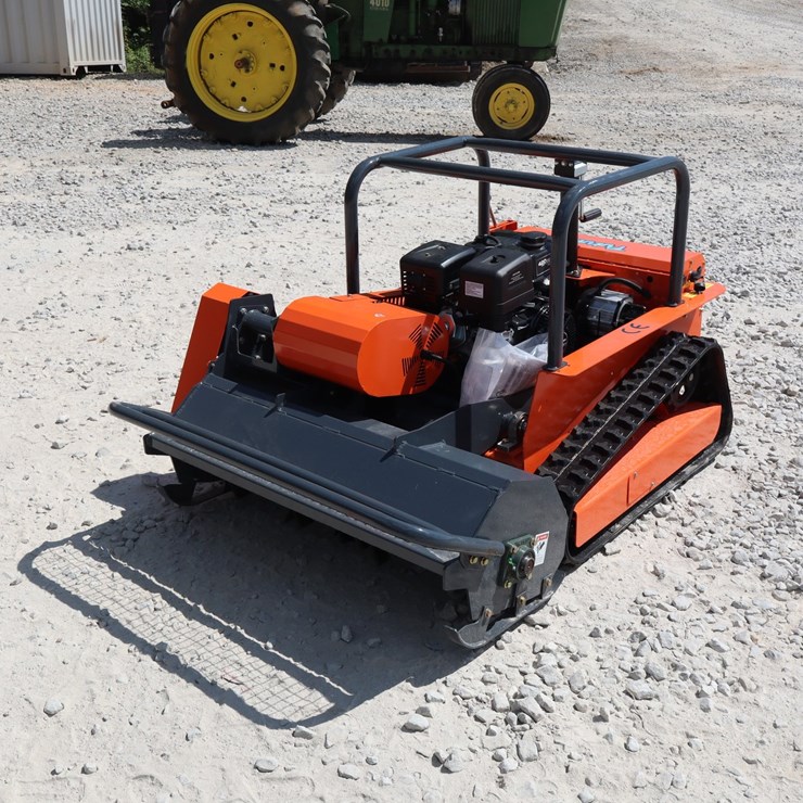 #249 • REMOTE CONTROL LAWN MOWER- DAMAGED- PLEASE SEE ALL PHOTOS!