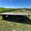#5722-•-wooden-flat-rack-on-running-gear-image-1