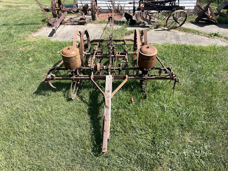 #1622-•-antique-mccormick-corn-planter-image-1