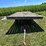 #5722-•-wooden-flat-rack-on-running-gear-image-2