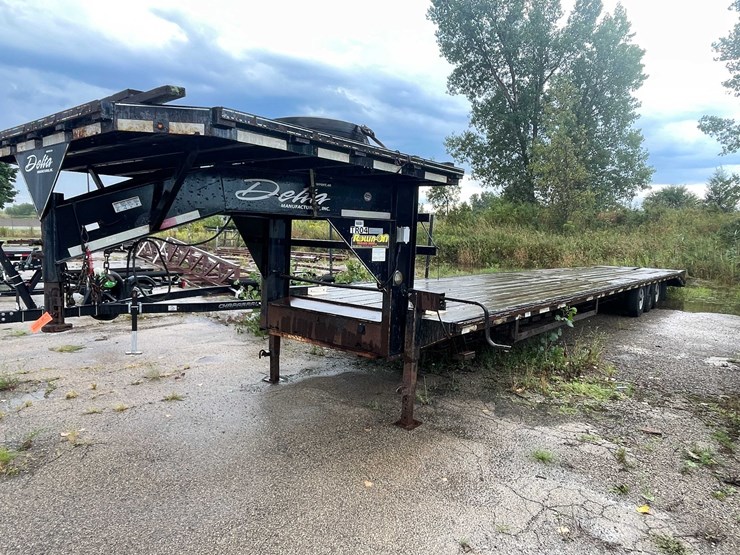#10501-•-2016-delta-gooseneck-flatbed-(has-wi-title)-image-1