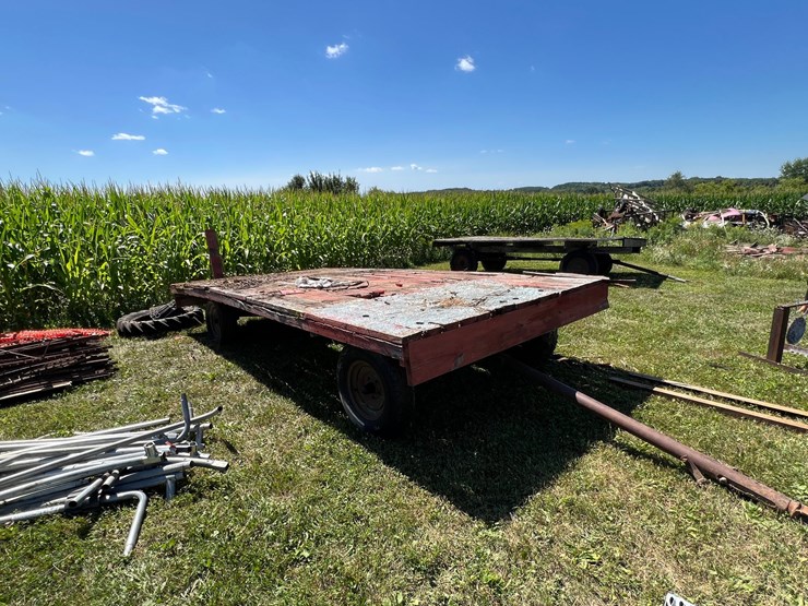 #5719-•-wooden-flat-rack-on-running-gear-image-1