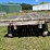 #5722-•-wooden-flat-rack-on-running-gear-image-4