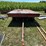 #5719-•-wooden-flat-rack-on-running-gear-image-2