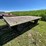 #5722-•-wooden-flat-rack-on-running-gear-image-3