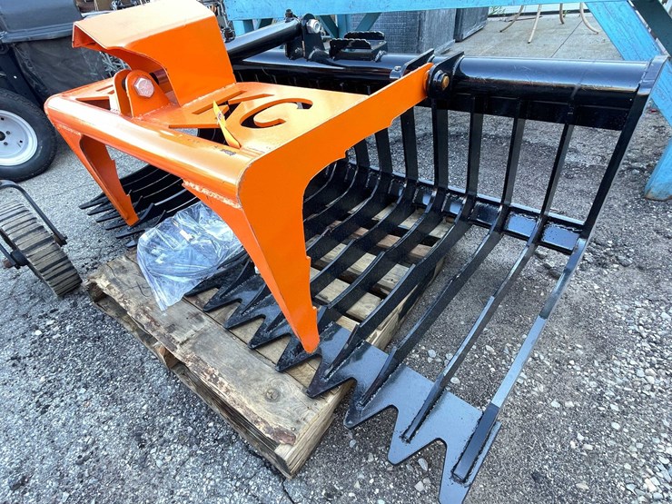 #9103-•-rock-bucket-with-grapple-arm-(o4)-image-1