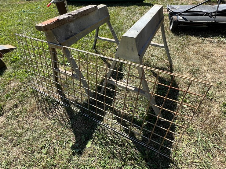 #5745-•-pair-of-aluminum-saw-horses-with-metal-panel-image-1