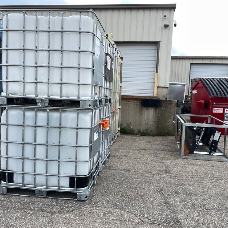 #9044 • (2) 275 Gallon IBC Caged Totes (OF)