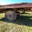 #5719-•-wooden-flat-rack-on-running-gear-image-5