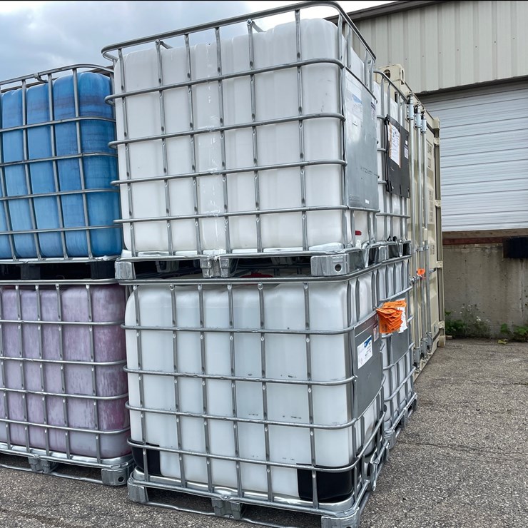 #9026 • (2) 275 Gallon IBC Caged Totes (OF)