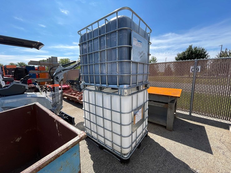 #9001-•-(2)-275-gallon-ibc-caged-totes-(o9)-image-1