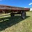 #5719-•-wooden-flat-rack-on-running-gear-image-6