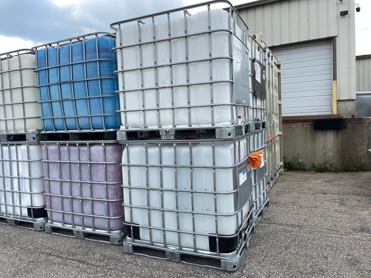 #9028-•-(2)-275-gallon-ibc-caged-totes-(of)-image-1