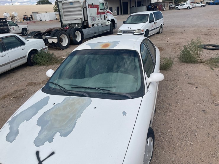 #1885-•-1999-ford-taurus-se-4-door-sedan-(has-nm-title)-(offsite-at-nmsu)-image-11