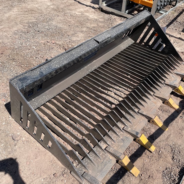 #2415 • Unused 2026 Landhonor Skid Steer Rock Bucket Attachment