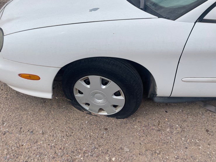 #1885-•-1999-ford-taurus-se-4-door-sedan-(has-nm-title)-(offsite-at-nmsu)-image-9