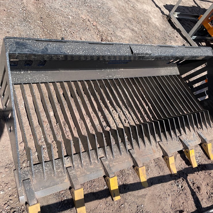 #2412 • Unused 2026 Landhonor Skid Steer Rock Bucket Attachment
