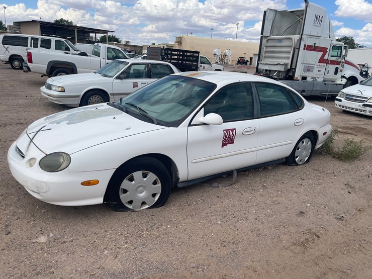 #1885-•-1999-ford-taurus-se-4-door-sedan-(has-nm-title)-(offsite-at-nmsu)-image-1