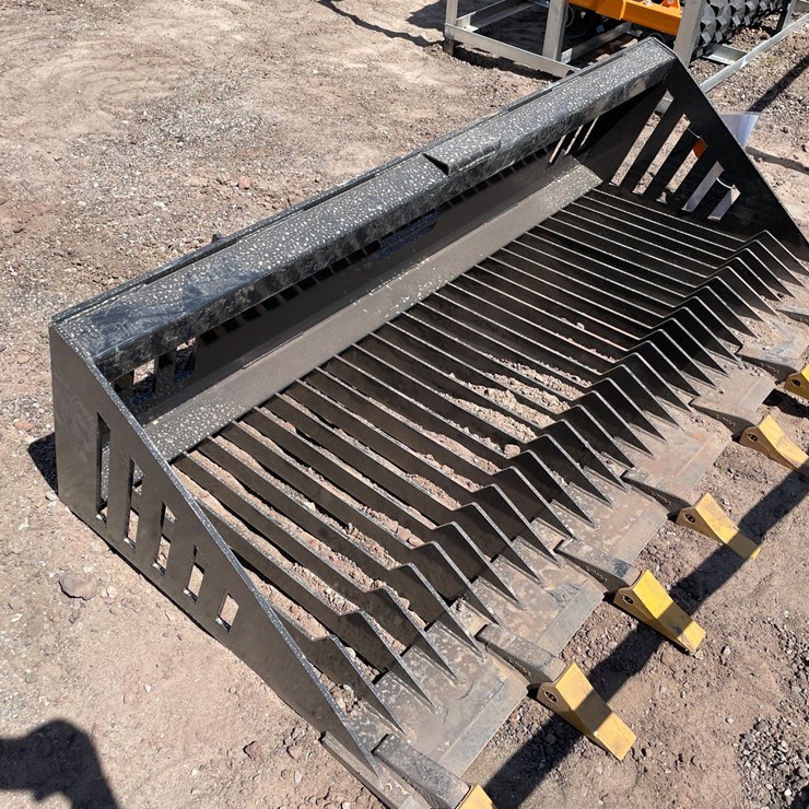 #2413 • Unused 2026 Landhonor Skid Steer Rock Bucket Attachment