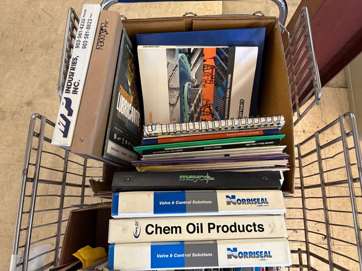 shopping-cart-full-of-assorted-oilfield-equipment-catalogs-image-4