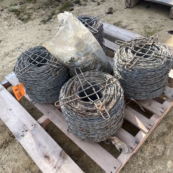 #3878 • (4) Rolls of Barb Wire Fencing
