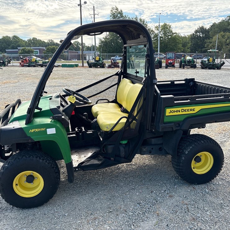 #1079 • John Deere 815E Utility Vehicle