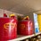 top-shelf-w/-(3)-10-gal-igloo-drinking-coolers,-(1)-gpi-alum-hp-100-hand-pump,-(2)eagel-5-gal.-safety-cans-image-5
