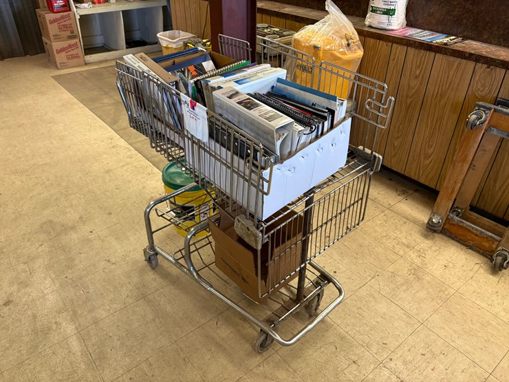 shopping-cart-full-of-assorted-oilfield-equipment-catalogs-image-1