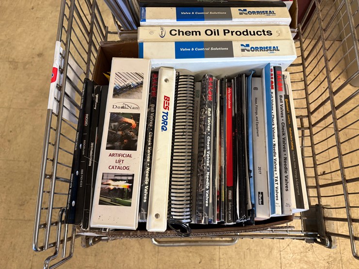 shopping-cart-full-of-assorted-oilfield-equipment-catalogs-image-3