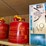 top-shelf-w/-(3)-10-gal-igloo-drinking-coolers,-(1)-gpi-alum-hp-100-hand-pump,-(2)eagel-5-gal.-safety-cans-image-4
