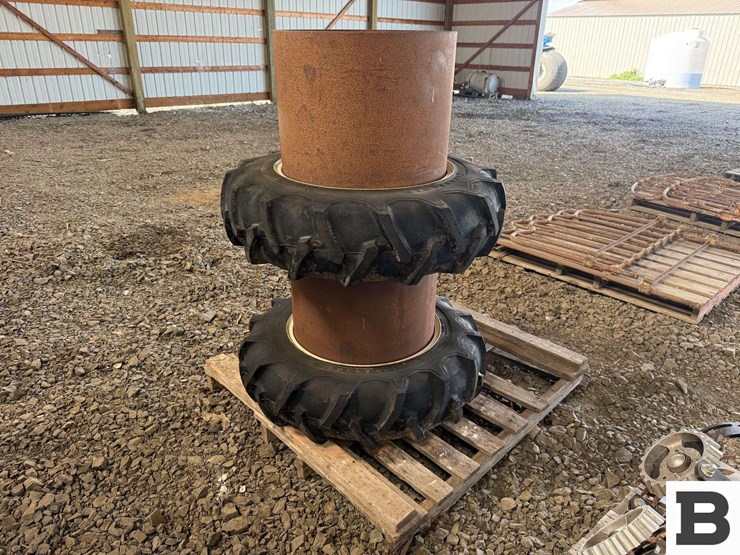 11.2-24-tractor-tires-on-rims-w/-wheel-spacers-image-1
