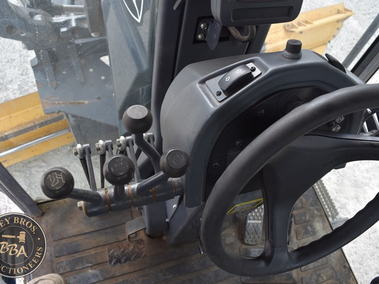 2010-deere-670g-image-56
