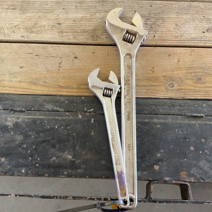 (2) large adjustable wrenches