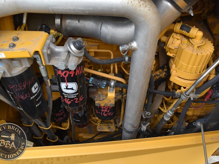2010-deere-670g-image-44