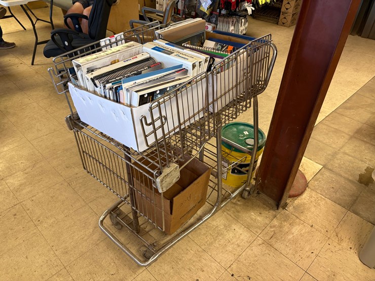 shopping-cart-full-of-assorted-oilfield-equipment-catalogs-image-2