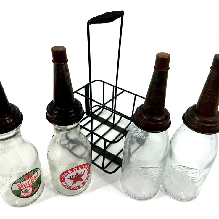 #1000 • VINTAGE GLASS OIL BOTTLES WITH METAL CARRIER