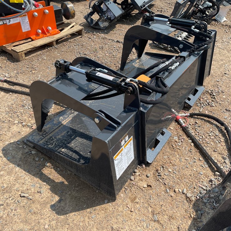 #2089 • 2026 Wolverine Skid Steer Grapple Bucket Attachment