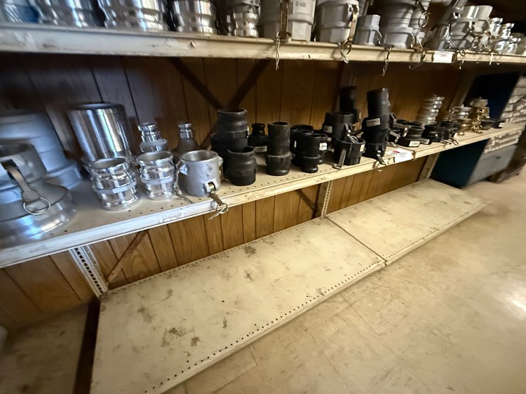 4th-shelf-of-(30+)-2”-thru-4”-alum-&-pvc-camlock-fittings,-image-1